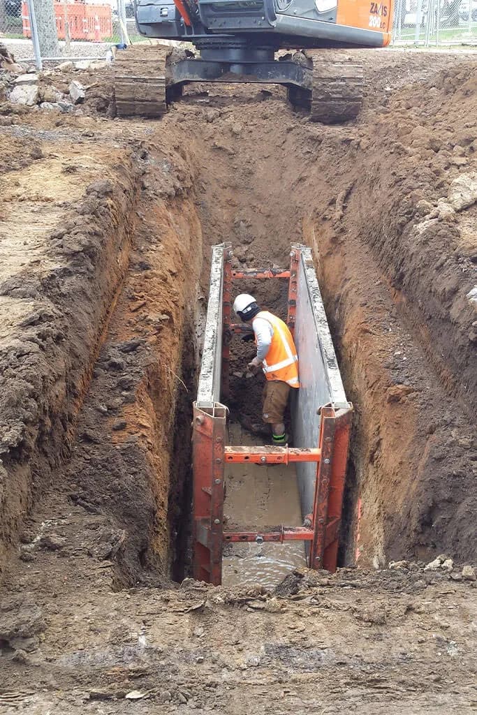 Professional trench protection equipment at construction site